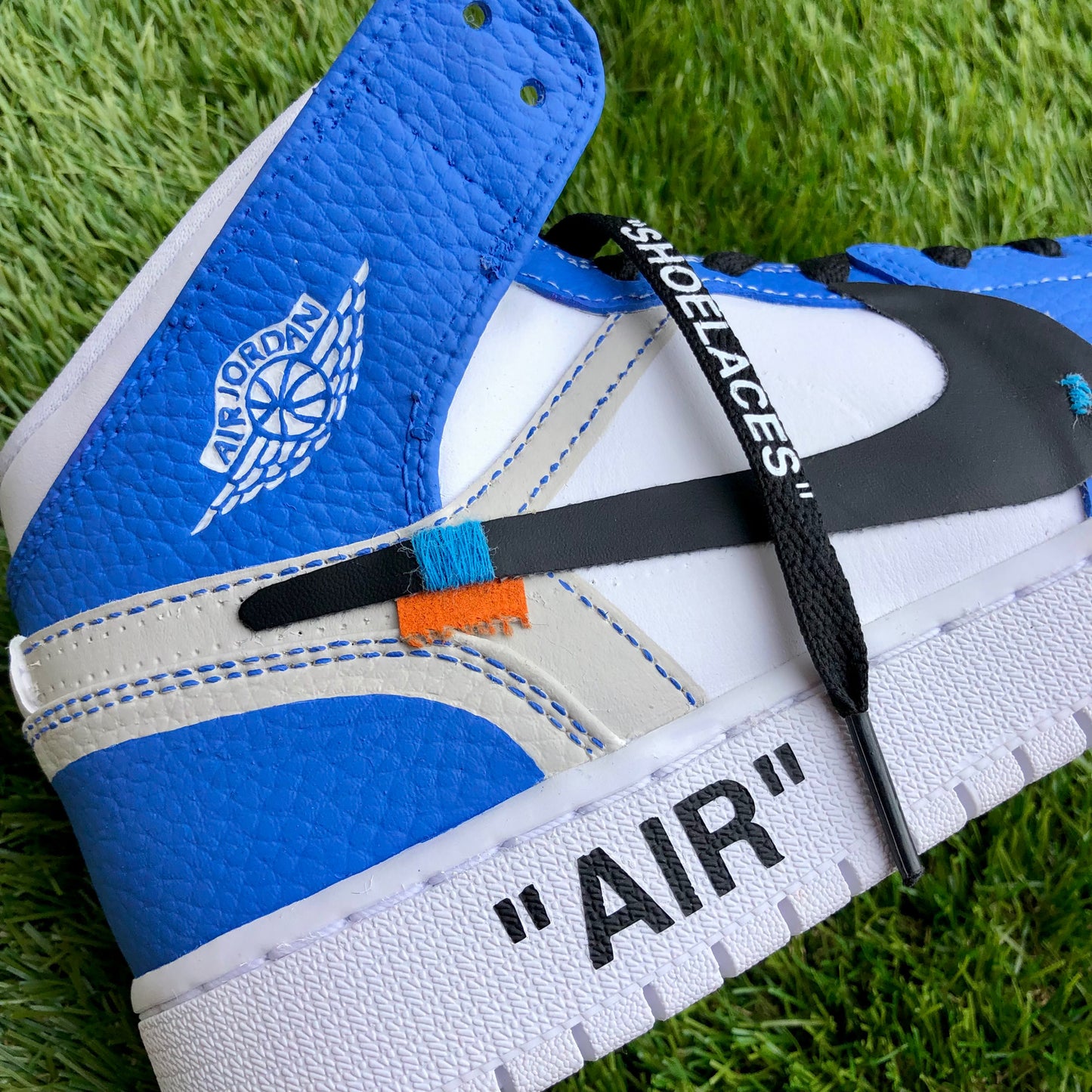 JORDAN 1 MID “ZIP TIE”